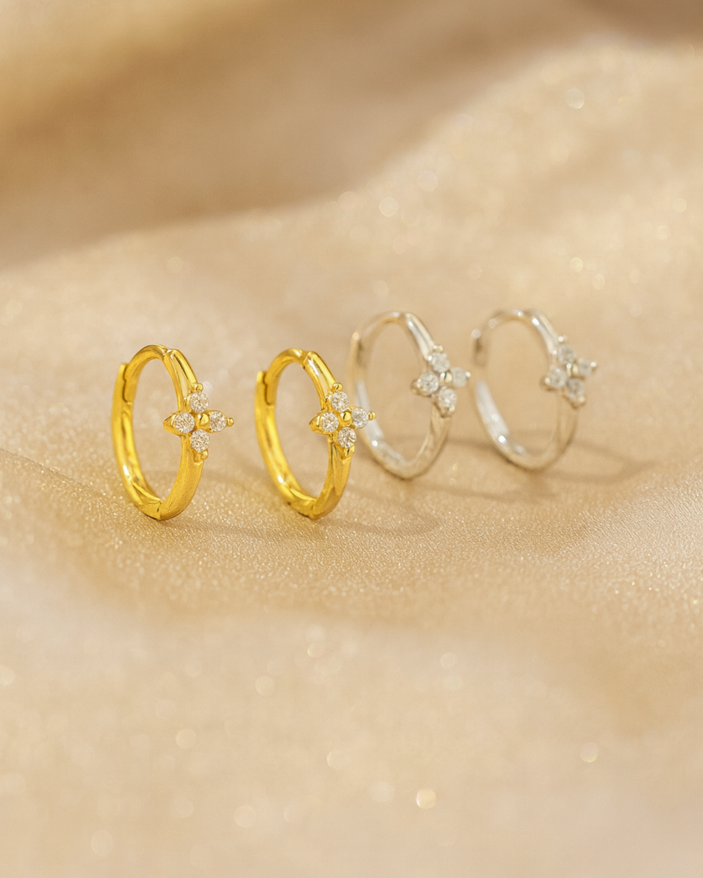 Creolen in Blumenform aus Sterling Silber mit Zirkonia, vergoldet von PERLI.