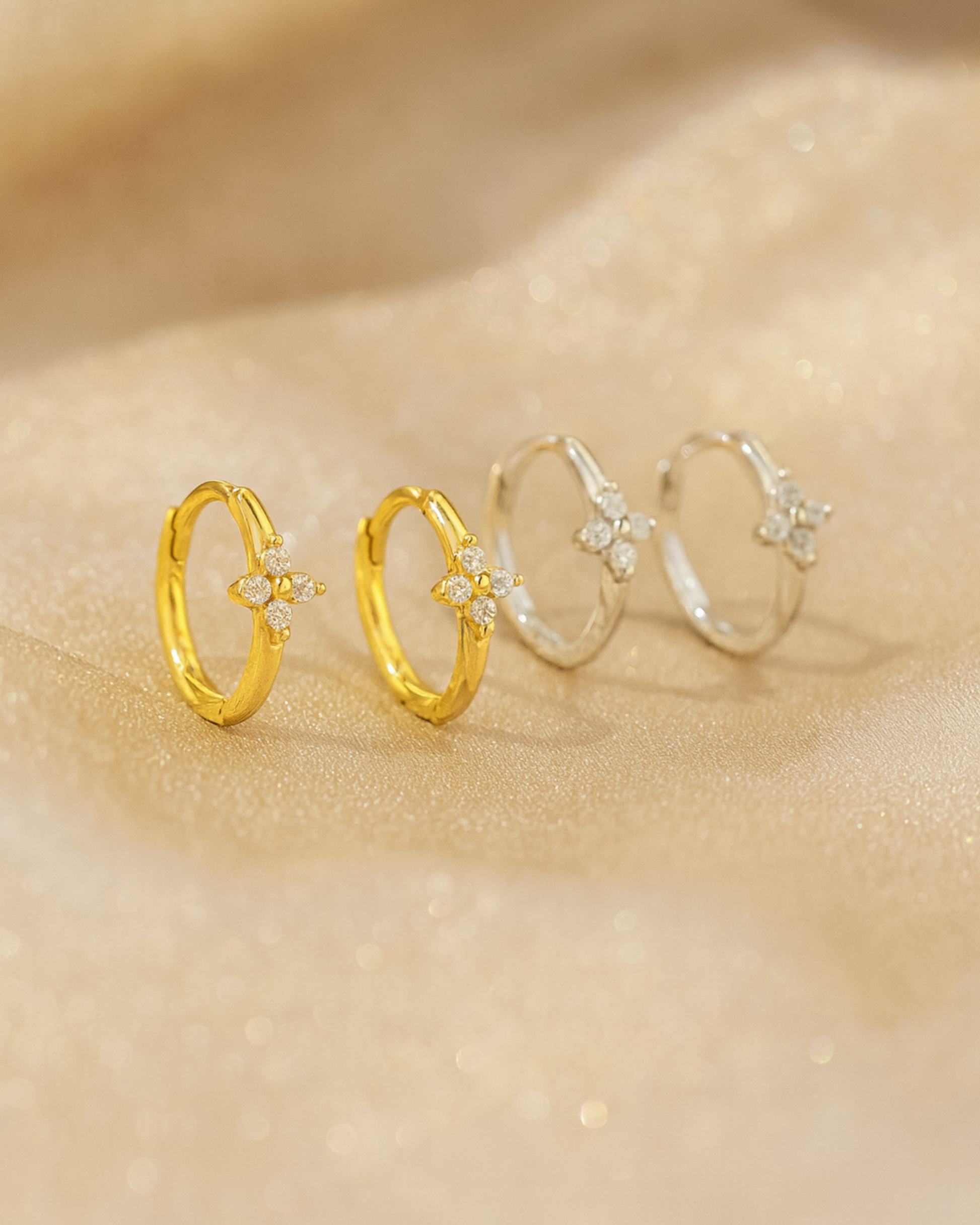 Creolen in Blumenform aus Sterling Silber mit Zirkonia, vergoldet von PERLI.